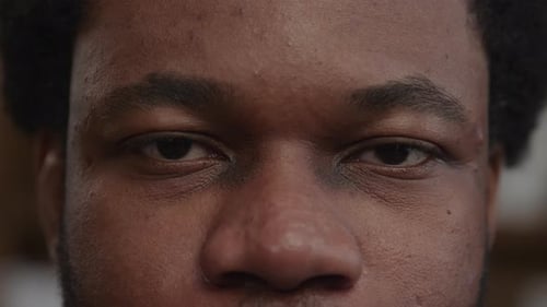 Intimate Close Up of Man Opening and Closing Eyes