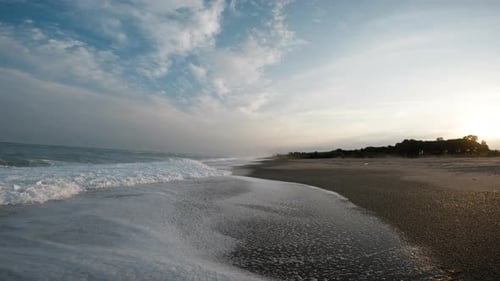 The Beach Of South Italy With Waves Crashing