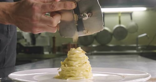 Egg pasta dish, typical Italian, with fine white truffle grated on top. Concept of: gourmet cuisin