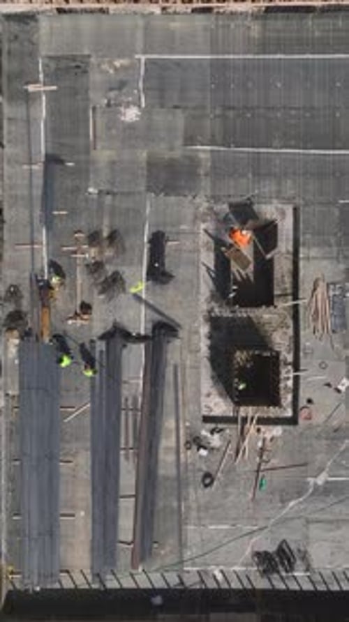 Vertical Video Rapid Construction Progress Captured in Timelapse with Builders Engineers and
