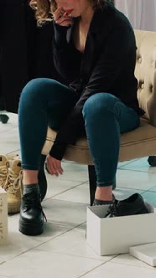 Vertical Video Trendy Customer Trying on Elegant Shoes with Laces at Fashion Boutique