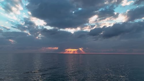 Beautiful Sunset with Colorful Yellow and Blue Cloudy Sky