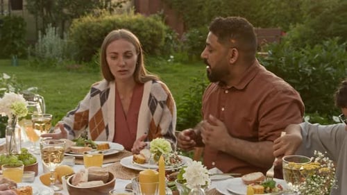Middle Eastern Man Hosting Cozy Family Gathering
