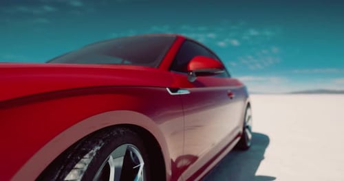 Modern Red Sports Car Driving on Flat Desert Landscape