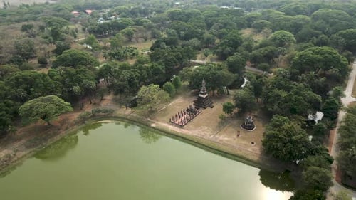 View From the Sky of a Monument Next to a Water Reservoir