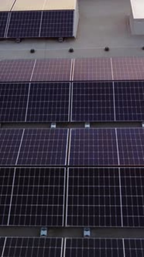 Solar Panels on Building Wall during Daytime