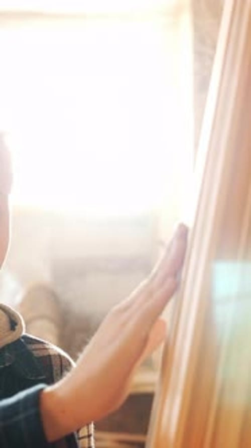 Child Craftsman Smoothing Wood in Bright Light
