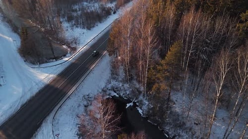 Serene Winter Road and Snowy Forest Beautifully Blurry Background Footage for a Calm and Atmospheric