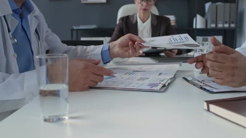 Medical Team Collaborating at Office Business Meeting