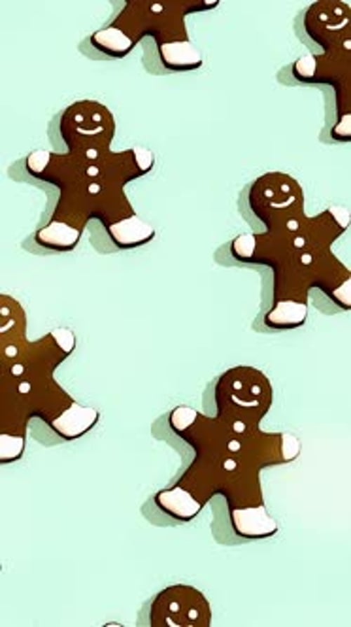 Gingerbread Cookies on a Light Green Background