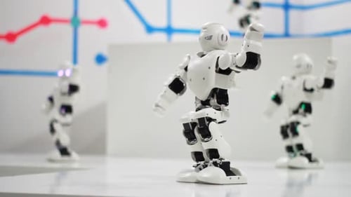 Humanoid Robot Dance. Group of Cute Robots Dancing. Close Up of Smart