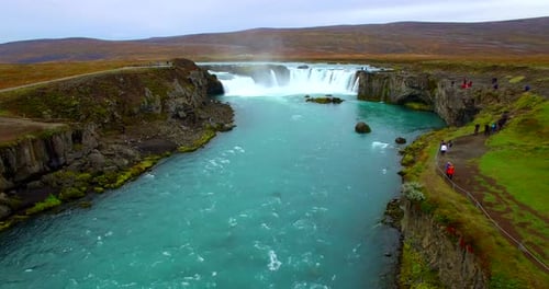 Waterfall and a river by drone Iceland