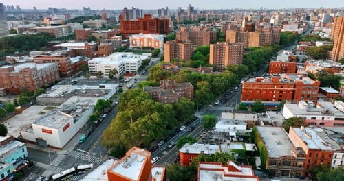 Footage above the residential area with green neighborhoods. Top view on the cityscape of New York