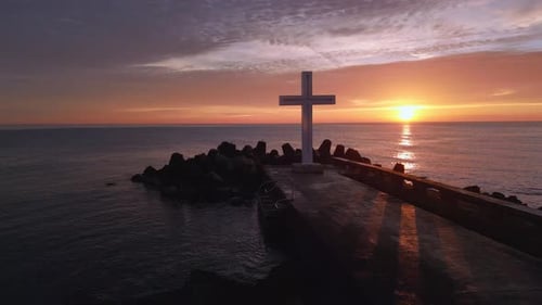 A Flight Around a Christian Holy Cross Early in the Morning at Sunrise The Large Cross Stands on the