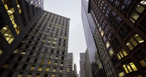 Traditional Masonry Intersects with Modern Glass in Cityscape Design