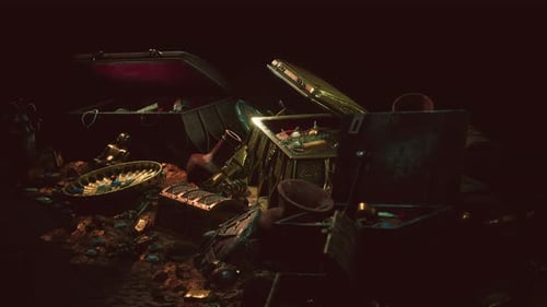 Handful of Gold Jewelry on a Dark Background