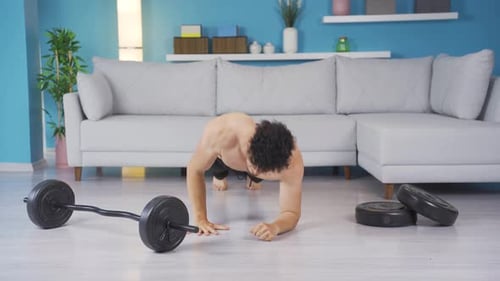 Athletic Man Doing Push Ups at Home