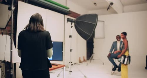 Woman, photographer and camera with photoshoot in studio for professional