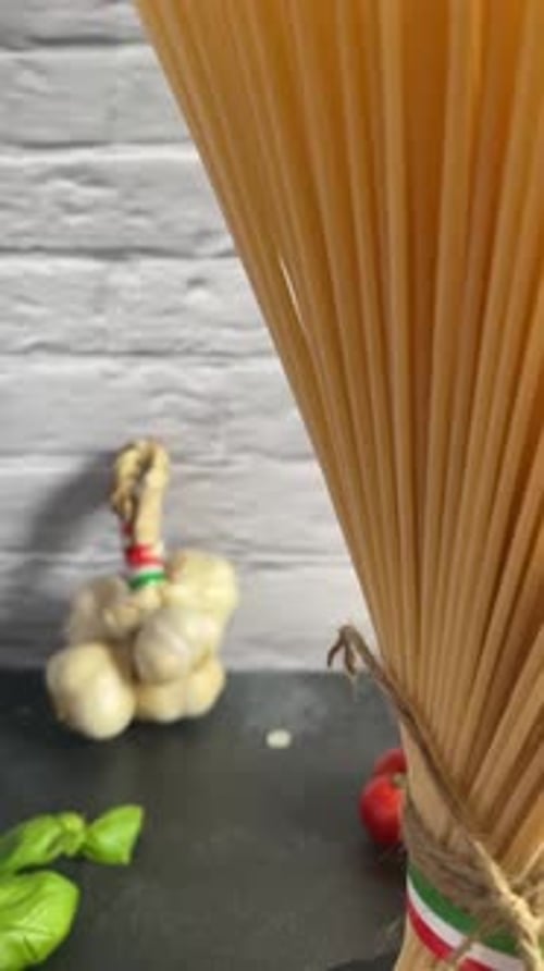 vertical italian spaghetti pasta Italy flag kitchen tomato garlic basil rope tied view, kitchen with