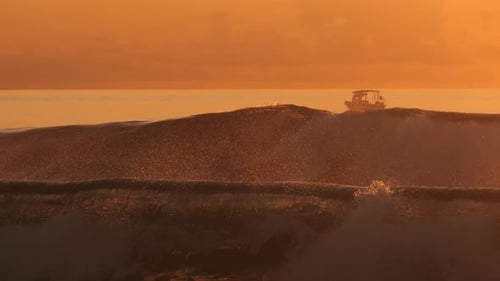 Peaceful Seaside Setting Capturing Lone Surfer Amidst Shimmering Waves at Dusk