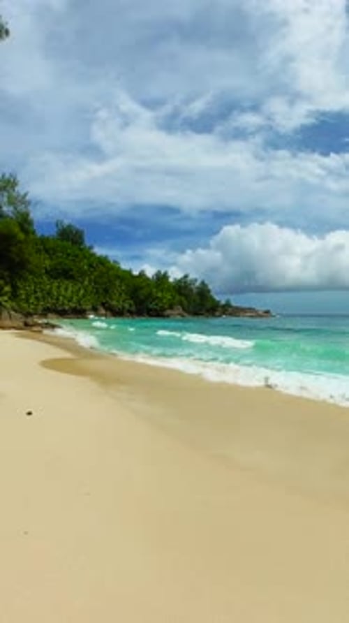 Secluded Sandy Beach with Turquoise Ocean and Lush Greenery Seychelles Mahe