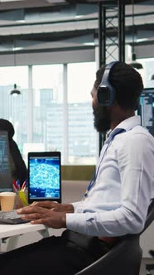 Vertical Video Programmer in Office Relies on AI Machine Learning to Automate Repetitive Tasks