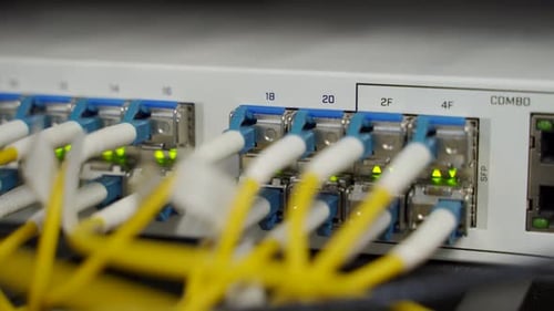 Optical Server and Router of the Data Center Server Room Network Equipment Blinking with Lights on