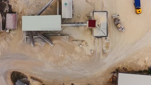Aerial view of industrial area with trucks, Italy.