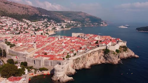 Aerial view of rooftops of Dubrovnik old historical town and Adriatic sea in Croatia. UNESCO World