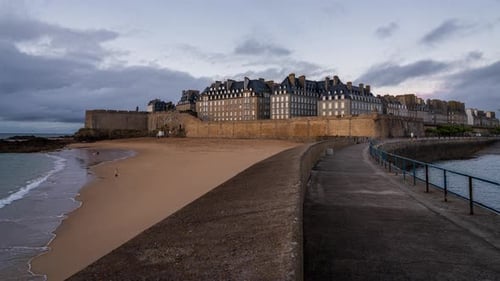 Walled City on Beach at Sunset