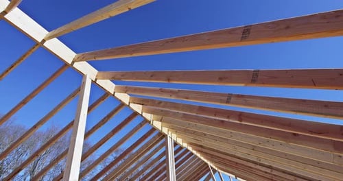 Framework of a Wood Roof Construction, Clear Blue Sky