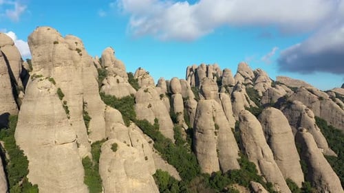 Aerial views of Montserrat peaks, a mountain range in Catalonia. Montserrat conglomerate crags