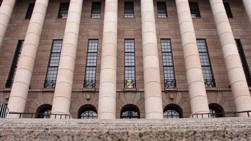 Classical architecture of Helsinki Parliament House, grand columns, daytime, no people, wide shot sl