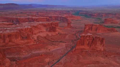Aerial View of Red Rock Formations and Desert Landscape