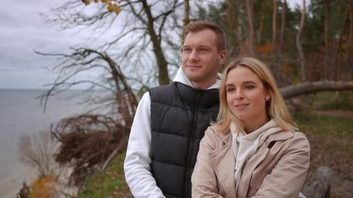 Romantic Couple Embracing in the Autumn Forest