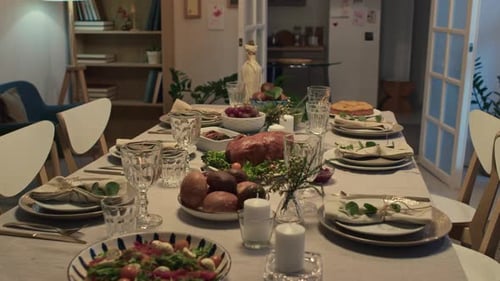 Dinner Table with Turkey, Salads, Fruit and Other Festive Dishes