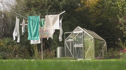 Clothes Drying on Rotary Line in Yard