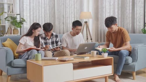 Four Students Studying Together in Living Room