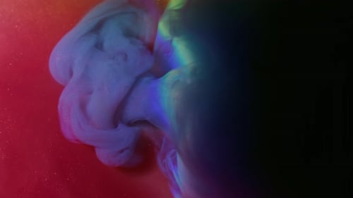 Colorful Abstract Ink Explosion with Rainbow Light