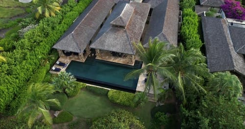 Aerial View of Luxury Villa With Private Swimming Pool in Green Tropical Lush of Exotic Island
