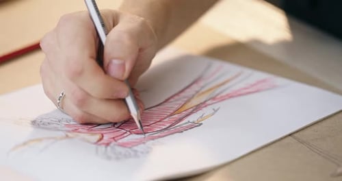 Hand Drawing Fashion Design on Paper