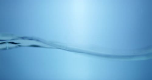 Rippling Water Surface in Light Blue Background