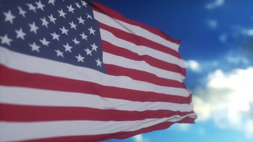 Realistic American Flag Waving Against a Clear Blue Sky