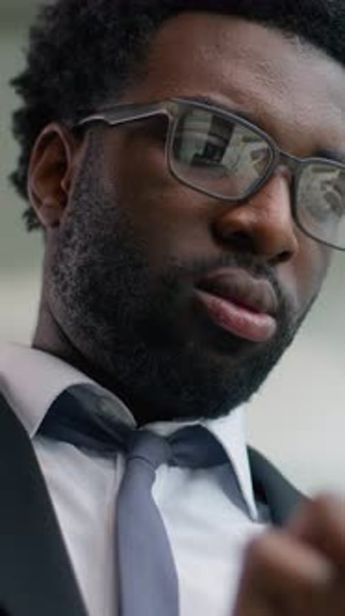 Happy African American Businessman in Office Smiling Using Digital Tablet Modern Technology Business