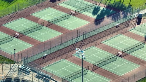 Aerial View of Open Air Tennis Court with New Stadiums in Rural Florida American Sport
