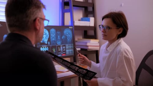 Doctor Discussing Brain Scan Results with Patient