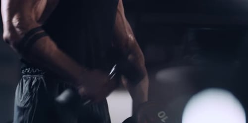 Bodybuilder in a Gym