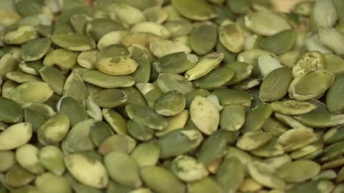 Green Pumpkin Seeds Rotating Close-Up