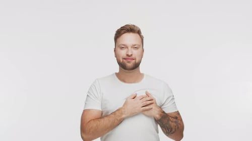 Expressive Young Man Over Vibrant Background Studio Portrait of Handsome Person