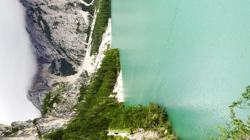Amazing Alpine Landscape with Cloudy Sky and the Braies Lake in Dolomites Italy Europe